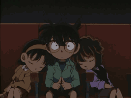 Ayumi Yoshida and Ai Haibara resting agianst Detective Conan Edogawa